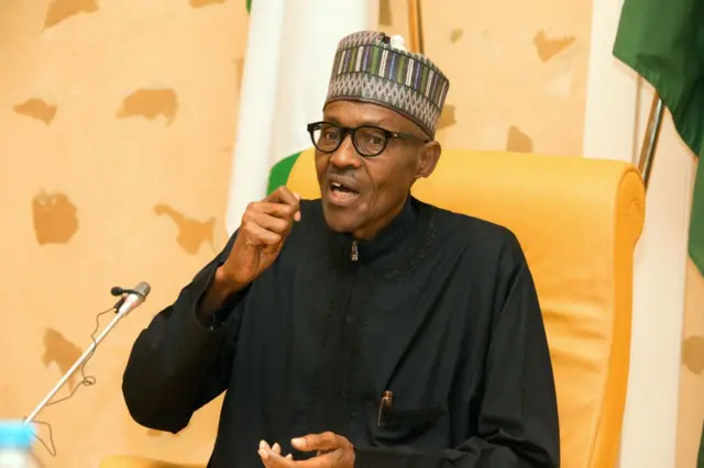 Nigerian President Muhammadu Buhari addresses members of his cabinet upon his arrival at the presidency in Abuja, on March 10, 2017