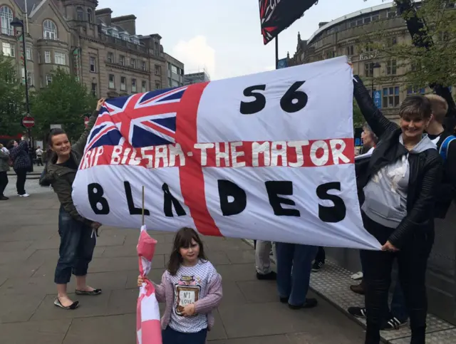 Sheffield United fans with a flag