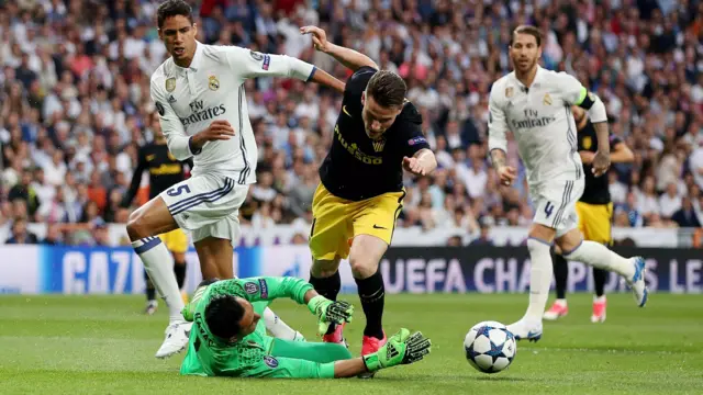 Keylor Navas of Real Madrid makes a save from Kevin Gameiro