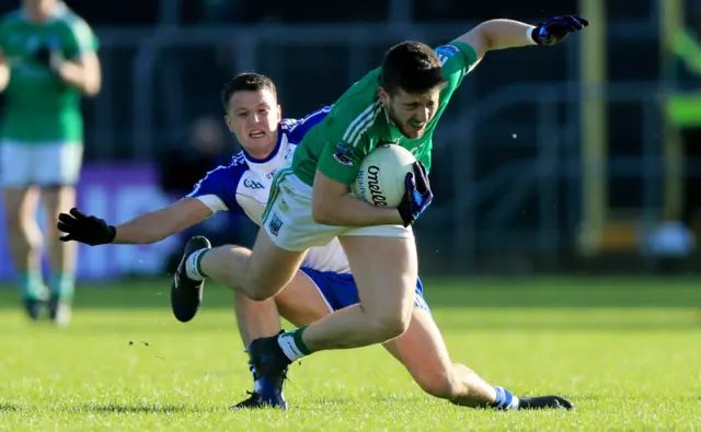 Fermanagh goalscorer Ryan Lyons is tackled by Monaghan defender Ryan Wylie