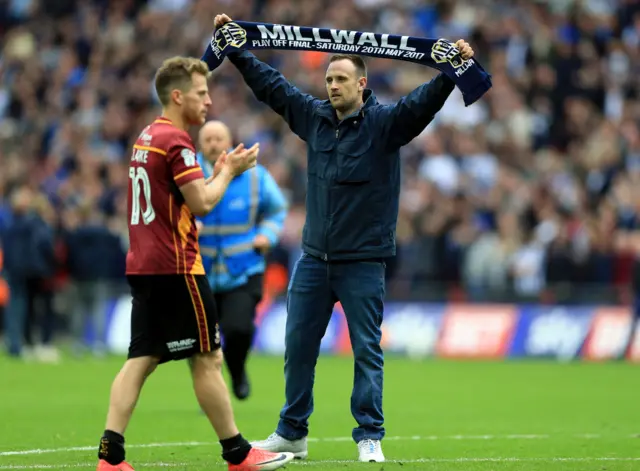 Millwall fan on the pitch