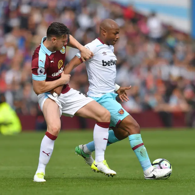 Kevin Long battles with West Ham United's Andre Ayew