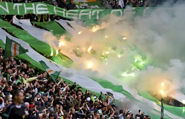 Celtic fans celebrate during the win over Hearts