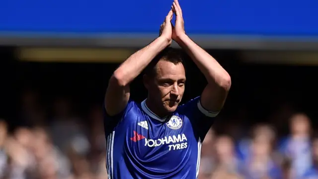 John Terry applauds