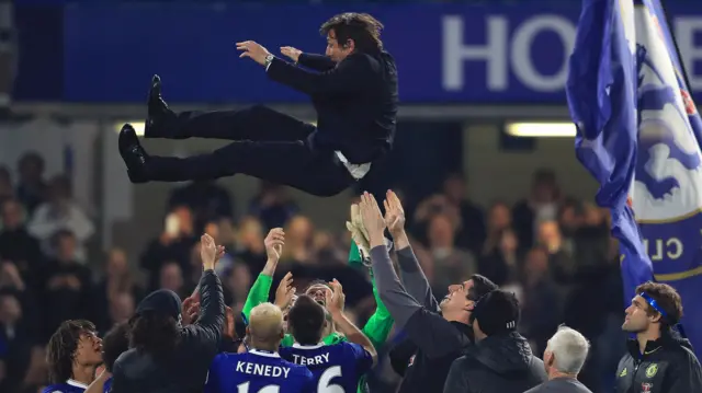 Antonio Conte thrown in the air by Chelsea players