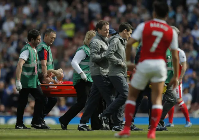 Gabriel gets taken off on a stretcher