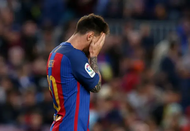 Lionel Messi looks dejected