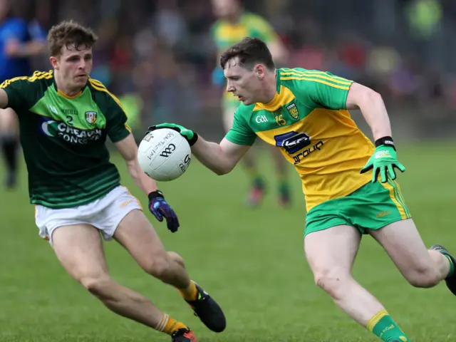 Jamie Brennan tries to evade Conor Hamill at Ballybofey