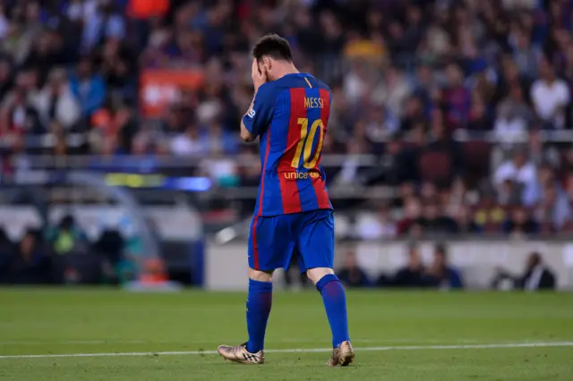 Lionel Messi gestures after missing a goal