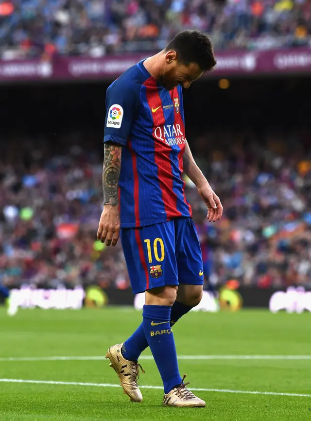 Lionel Messi looks dejected