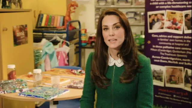 The Duchess, wearing green, at the EACH hospice