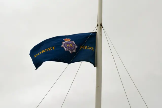 Dorset Police flag at half mast