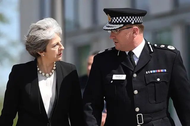 theresa may with police