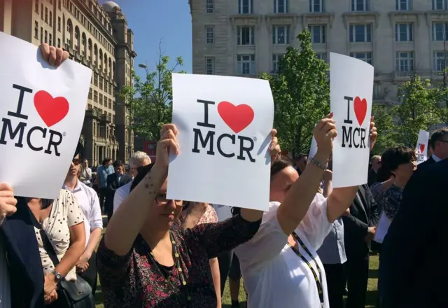 People at Liverpool waterfront during silence for victims of Manchester attack