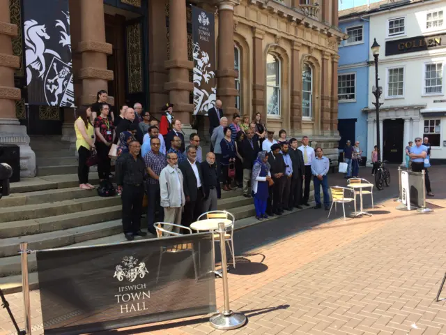 People standing on steps of town hall in Ipswich