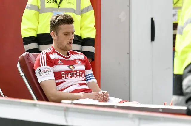 Accies' Mikey Devlin goes off injured against Dundee