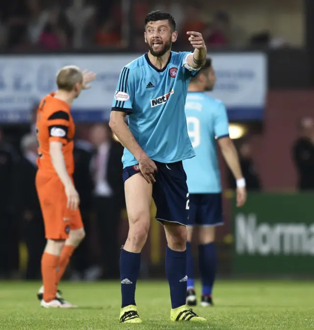 Accies' Massimo Donati holds his injured thigh