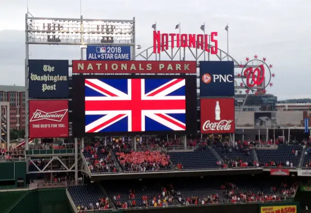 A union jack is displayed on one of the screens at Nationals Park, home of the Nationals major league baseball team, in Washington