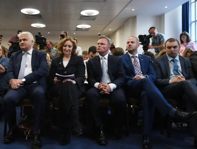 MEP Patrick O"Flynn (Left), Suzanne Evans, Deputy Chairman (second left), and deputy leader Peter Whittle (Centre) listen to  leader Paul Nuttall