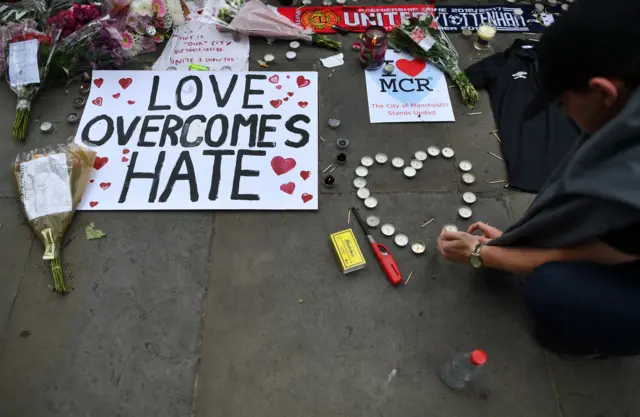 Love overcomes hate banner in Manchester