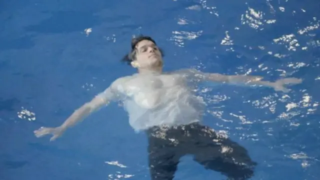 Man floating in water