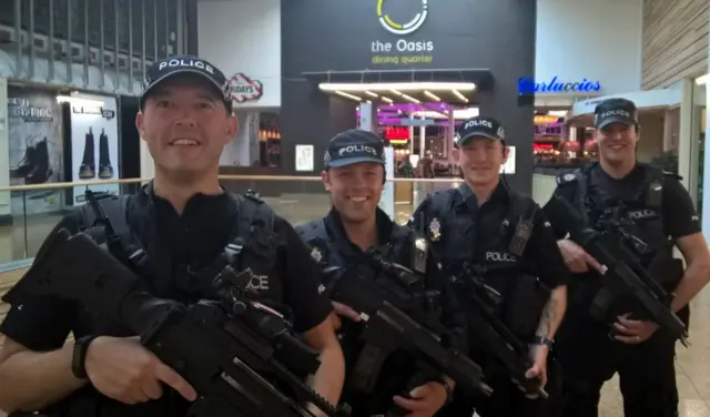 Armed police at the Meadowhall Shopping Centre in Sheffield