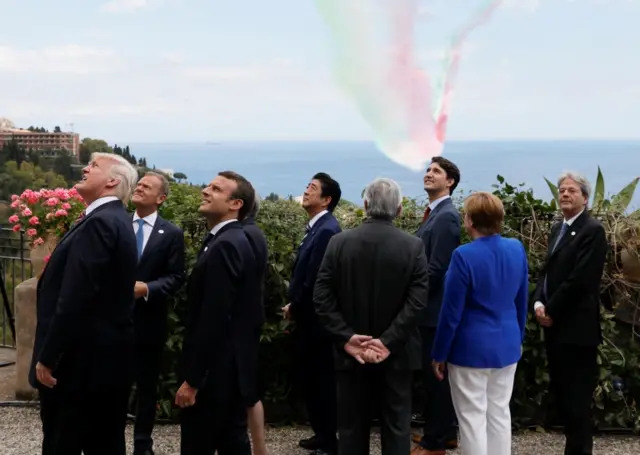 G7 leaders watch an Italian flying squadron at the G7 Summit in Taormina