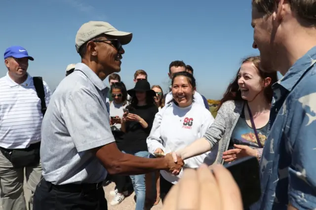 Barack Obama greeting spectators in St Andrews