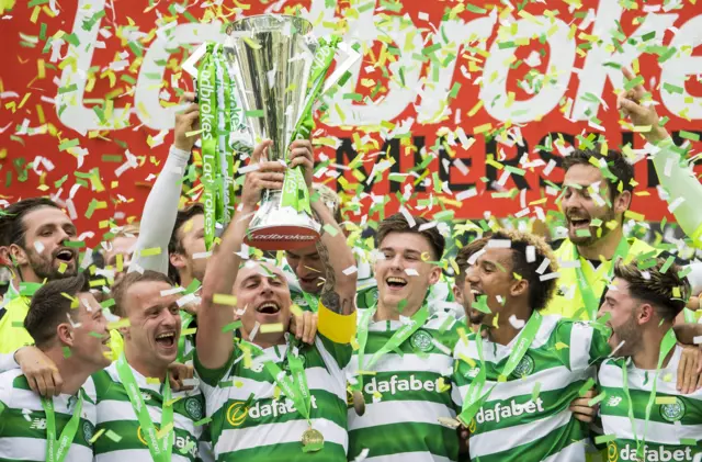 Celtic captain Scott Brown lifts the Scottish Premiership trophy