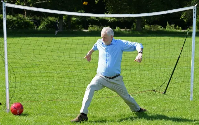 Jeremy Corbyn plays football on Hackney Marshes