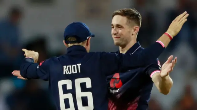 Chris Woakes and Joe Root