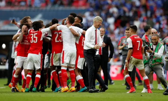 Arsenal team celebrate cup final win