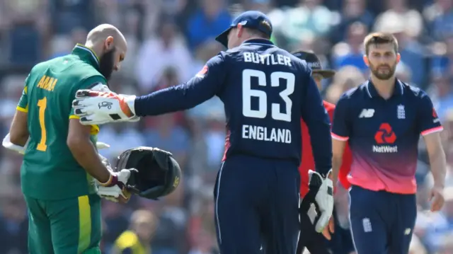 Jos Buttler checks on Hashim Amla