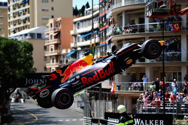 Ricciardo's car is taken off the track