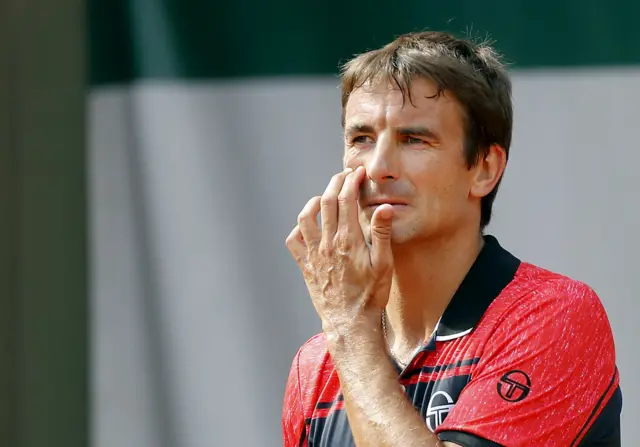 Tommy Robredo of Spain reacts