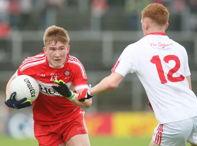 Derry's Richie Mullan in action against Tyrone's Daniel Millar