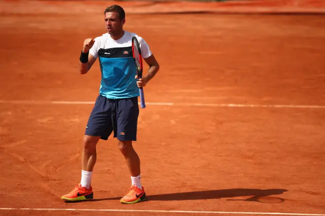 Dan Evans celebrates