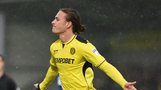 Jackson Irvine of Burton Albion celebrates after scoring.