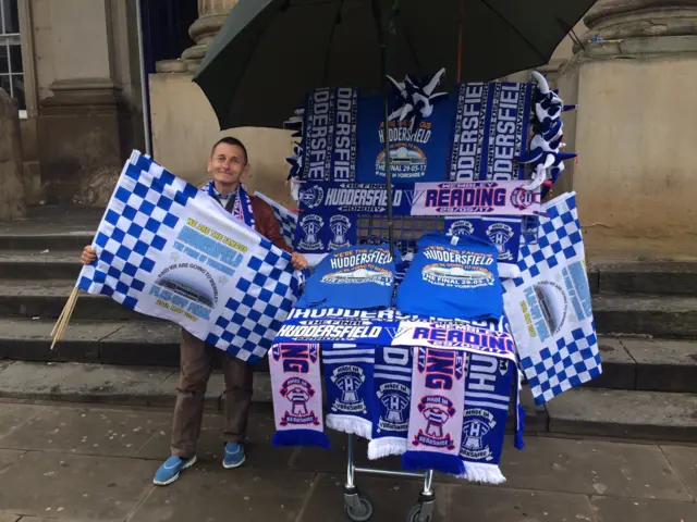 Simon with Huddersfield Town flags