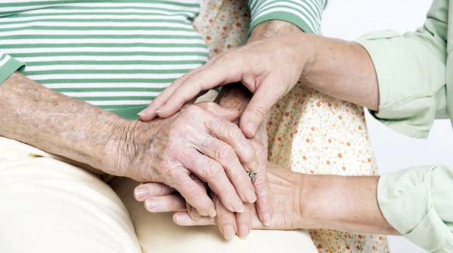 Carer with elderly woman