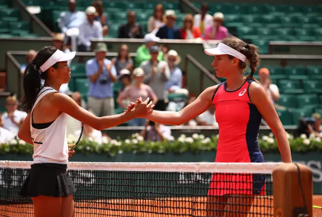 Hsieh and Konta shake hands