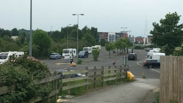 Traveller vans at car park