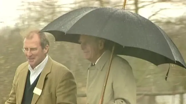 The Duke, under an umbrells