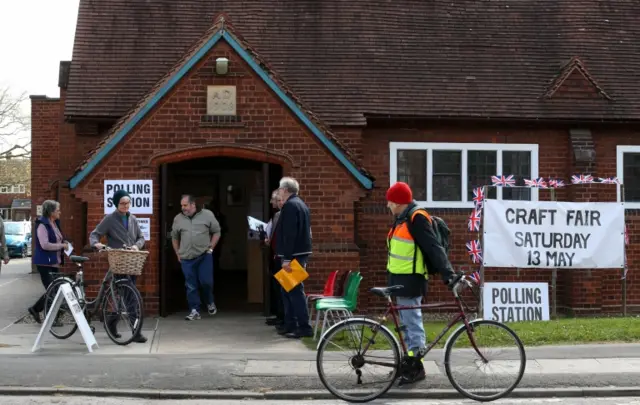 Voters coming out of polling station in Cambridge