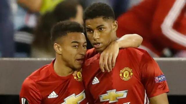 Jesse Lingard celebrates with Marcus Rashford