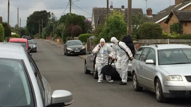 Police forensics officers in Brundall