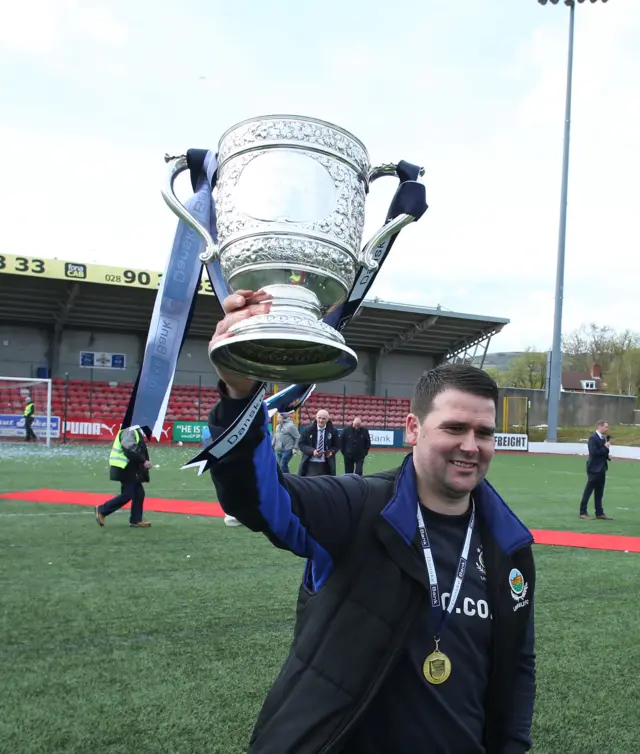 Linfield manager David Healy celebrates winning the Irish Premiership title