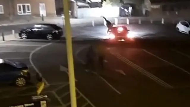 The victim being thrown into the air by a car