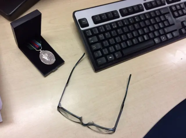 Medal on desk