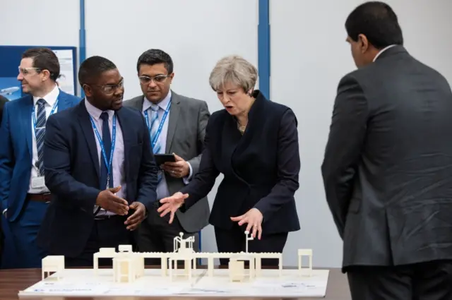 Theresa May during a visit to the UTC Aerospace Systems factory during a campaign in Wolverhampton with newly-elected West Midlands Mayor Andy Street